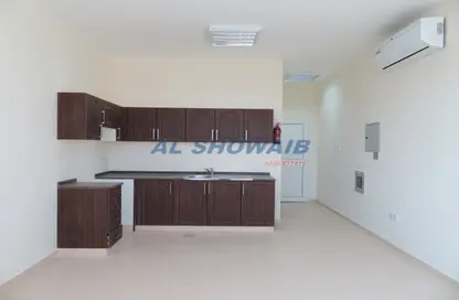 Kitchen image for: Apartment - 1 Bathroom for rent in Al Lisaili - Dubai, Image 1
