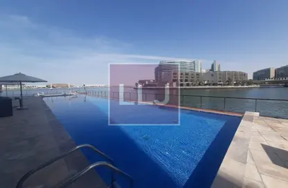 Pool image for: Apartment - 1 Bathroom for sale in Al Barza - Al Bandar - Al Raha Beach - Abu Dhabi, Image 1