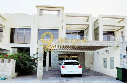 Outdoor Building image for: Townhouse - 3 Bedrooms - 4 Bathrooms for rent in The Polo Townhouses - Meydan Gated Community - Meydan - Dubai, Image 1