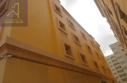 عمارة بالكامل - 8 غرف نوم - 8 حمامات للبيع في تجارية مويلح - الشارقة