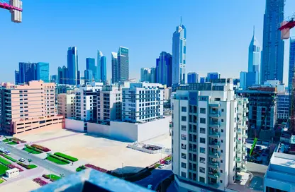 Apartment - 3 Bedrooms - 4 Bathrooms for rent in Jumeirah Garden City - Al Satwa - Dubai