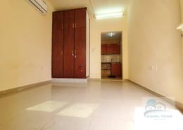 Empty Room image for: Studio - 1 bathroom for rent in Khalifa City A - Khalifa City - Abu Dhabi, Image 1