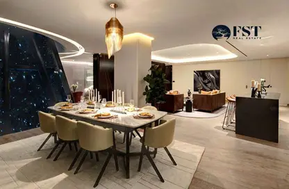 Living / Dining Room image for: Apartment - 1 Bedroom - 2 Bathrooms for sale in The Opus - Business Bay - Dubai, Image 1