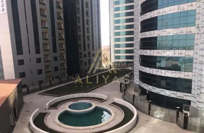 شقة - غرفة نوم - 2 حمامات للبيع في أورينت تاور 1 - أورينت تاور - البستان - عجمان