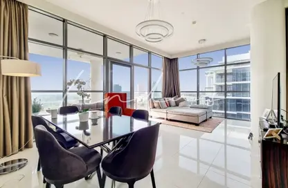 Living / Dining Room image for: Apartment - 3 Bedrooms - 5 Bathrooms for rent in Golf Veduta A - Golf Veduta Hotel Apartments - DAMAC Hills - Dubai, Image 1