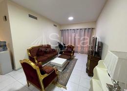Living Room image for: Apartment - 1 bedroom - 2 bathrooms for rent in Golf Apartments - Al Hamra Village - Ras Al Khaimah, Image 1