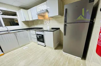 Kitchen image for: Apartment - 2 Bedrooms - 2 Bathrooms for rent in Sheikh Jaber Al Sabah Street - Al Naimiya - Al Nuaimiya - Ajman, Image 1