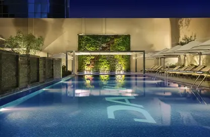 Pool image for: Apartment - 1 Bathroom for rent in The Cosmopolitan - Business Bay - Dubai, Image 1