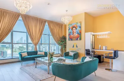 Living / Dining Room image for: Apartment - 2 Bedrooms - 3 Bathrooms for rent in Marina Arcade Tower - Dubai Marina - Dubai, Image 1