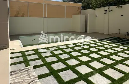 Garden image for: Townhouse - 5 Bedrooms - 6 Bathrooms for sale in Contemporary Style - Al Reef Villas - Al Reef - Abu Dhabi, Image 1