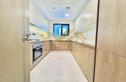 Apartment - 1 Bedroom - 2 Bathrooms for rent in Jumeirah Garden City - Al Satwa - Dubai