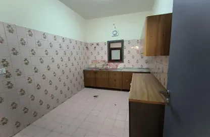 صورة لـ مطبخ شقة - 2 غرف نوم - 2 حمامات للايجار في 2  الروضة - الروضة - عجمان ، صورة رقم 1