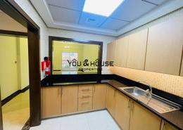 Kitchen image for: Apartment - 1 bedroom - 2 bathrooms for rent in Pantheon Boulevard - Jumeirah Village Circle - Dubai, Image 1