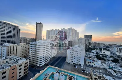 Outdoor Building image for: Apartment - 2 Bedrooms - 2 Bathrooms for rent in Orient Tower 1 - Orient Towers - Al Bustan - Ajman, Image 1