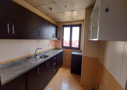 صورةمطبخ لـ: شقة - 2 غرف نوم - 3 حمامات للكراء في بوابة السيليكون رقم 1 - بوابات السيليكون - واحة السيليكون - دبي, صورة 1