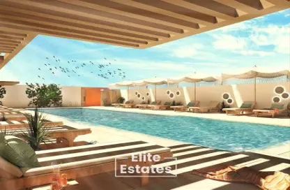 Pool image for: Apartment - 2 Bedrooms - 3 Bathrooms for sale in Luma 22 - Jumeirah Village Circle - Dubai, Image 1