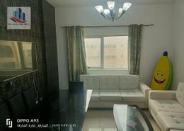 Living Room image for: Apartment - 1 bedroom - 1 bathroom for rent in Rose Tower - Al Khan - Sharjah, Image 1