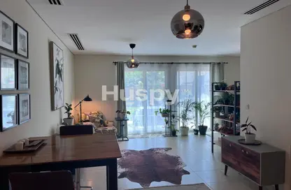 Living Room image for: Townhouse - 1 Bedroom - 2 Bathrooms for rent in Nakheel Townhouses - Jumeirah Village Circle - Dubai, Image 1