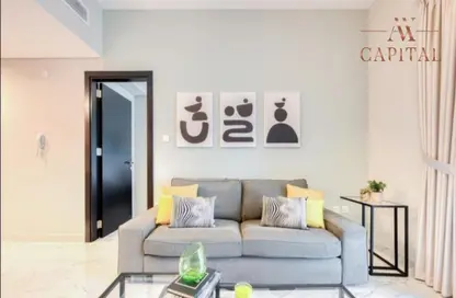 Living Room image for: Apartment - 1 Bedroom - 1 Bathroom for sale in MAG 520 - MAG 5 - Dubai South (Dubai World Central) - Dubai, Image 1