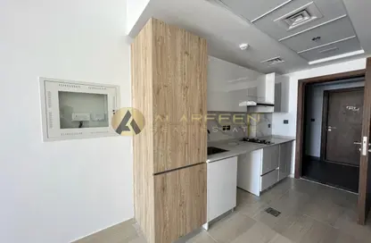 Kitchen image for: Apartment - 1 Bathroom for rent in Pantheon Elysee II - Jumeirah Village Circle - Dubai, Image 1