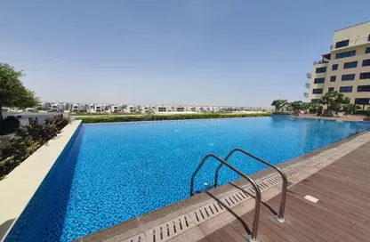 Pool image for: Apartment - 1 Bedroom - 1 Bathroom for sale in Golf Views - EMAAR South - Dubai South (Dubai World Central) - Dubai, Image 1