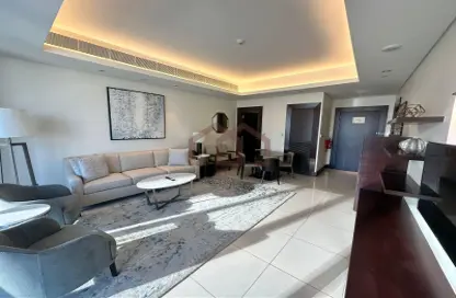 Living / Dining Room image for: Apartment - 1 Bedroom - 2 Bathrooms for sale in Burj Lake Hotel - The Address DownTown - Downtown Dubai - Dubai, Image 1