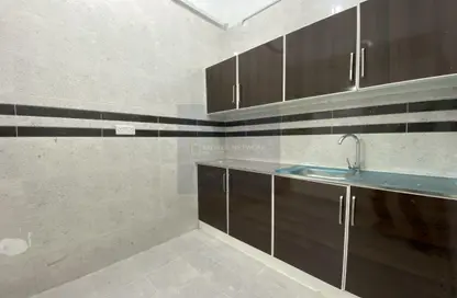 صورة لـ مطبخ شقة - غرفة نوم - 1 حمام للايجار في مدينة شخبوط - أبوظبي ، صورة رقم 1
