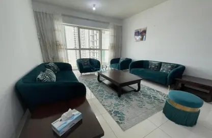 Living Room image for: Apartment - 1 Bedroom - 2 Bathrooms for sale in Burooj Views - Marina Square - Al Reem Island - Abu Dhabi, Image 1