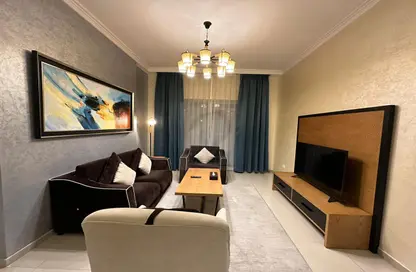 Living Room image for: Apartment - 1 Bedroom - 2 Bathrooms for rent in Class Hotel Apartments - Barsha Heights (Tecom) - Dubai, Image 1