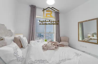 Room / Bedroom image for: Apartment - 1 Bedroom - 1 Bathroom for sale in Oasis Tower - Al Rashidiya 1 - Al Rashidiya - Ajman, Image 1