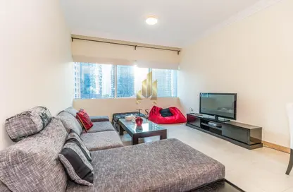 Living Room image for: Apartment - 1 Bedroom - 2 Bathrooms for rent in MAG 218 - Dubai Marina - Dubai, Image 1