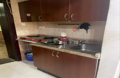 Kitchen image for: Apartment - 1 Bathroom for sale in Garden City - Ajman, Image 1