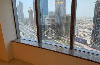 شقة - 2 غرف نوم - 2 حمامات للايجار في برج توينتي فرست سينشري - شارع الشيخ زايد - دبي