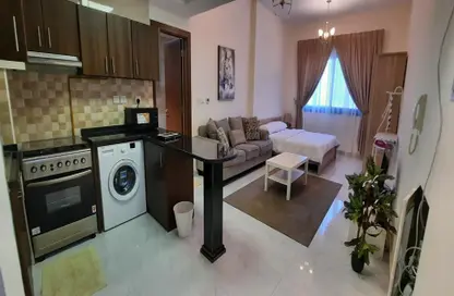 صورة لـ مطبخ شقة - 1 حمام للبيع في برج سيدني - قرية الجميرا سركل - دبي ، صورة رقم 1