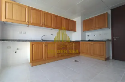 Kitchen image for: Apartment - 2 Bedrooms - 3 Bathrooms for rent in City Center Building - Hamdan Street - Abu Dhabi, Image 1