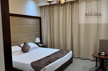 النزل و الشقق الفندقية - 1 حمام للايجار في بناية شارع البنك - منخول - بر دبي - دبي