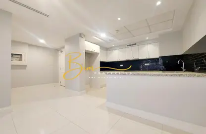 صورة لـ مطبخ شقة - 2 غرف نوم - 3 حمامات للايجار في مجمع ار دي كي السكني - روضة أبو ظبي - أبوظبي ، صورة رقم 1