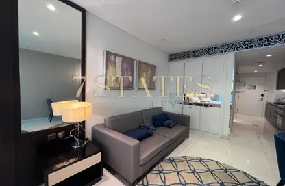 Living Room image for: Apartment - 1 Bathroom for rent in Damac Maison The Distinction - Downtown Dubai - Dubai, Image 1