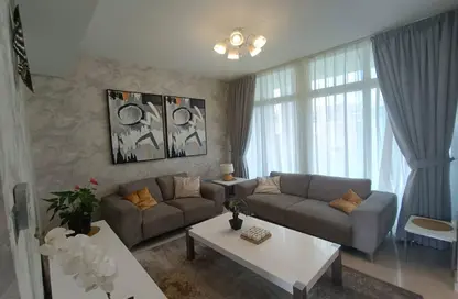 Living Room image for: Townhouse - 3 Bedrooms - 3 Bathrooms for sale in Madinat Hind - Mulberry - Damac Hills 2 - Dubai, Image 1