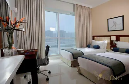 Apartment - 2 Bedrooms - 2 Bathrooms for rent in Treppan Hotel  and  Suites by Fakhruddin - Dubai Sports City - Dubai
