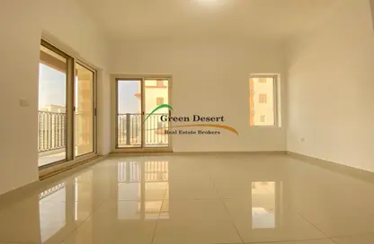 Empty Room image for: Apartment - 1 Bedroom - 2 Bathrooms for sale in Spanish Tower - Dubai Sports City - Dubai, Image 1