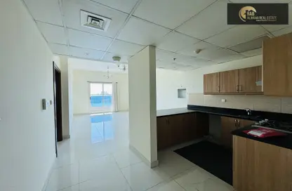 Kitchen image for: Apartment - 1 Bedroom - 2 Bathrooms for rent in Elite Sports Residence 4 - Elite Sports Residence - Dubai Sports City - Dubai, Image 1