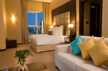 Room / Bedroom image for: Hotel  and  Hotel Apartment - Studio - 1 Bathroom for rent in Jannah Burj Al Sarab - Mina Road - Tourist Club Area - Abu Dhabi, Image 1