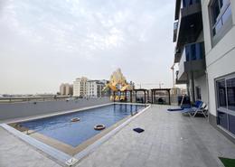 صورةحوض سباحة لـ: Studio - 1 حمام للكراء في مبنى اف 49 افنيو - 3 المرحلة - المدينة الدولية - دبي, صورة 1