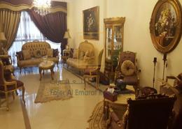 Living Room image for: Apartment - 3 bedrooms - 4 bathrooms for sale in Ameer Bu Khamseen Tower - Al Majaz 3 - Al Majaz - Sharjah, Image 1