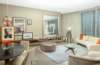 Living / Dining Room image for: Apartment - 1 Bedroom - 1 Bathroom for sale in Tower C - DAMAC Towers by Paramount - Business Bay - Dubai, Image 1