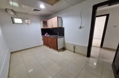 Kitchen image for: Apartment - 1 Bedroom - 1 Bathroom for rent in Mohammed Villas 24 - Mohamed Bin Zayed City - Abu Dhabi, Image 1