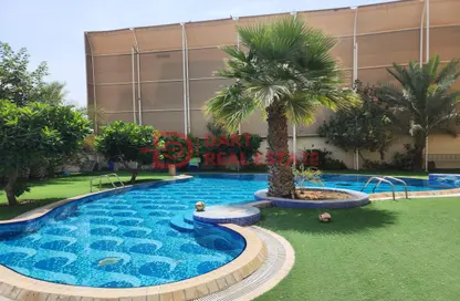 صورة لـ حوض سباحة فيلا - 7 غرف نوم للايجار في المنهل - أبوظبي ، صورة رقم 1