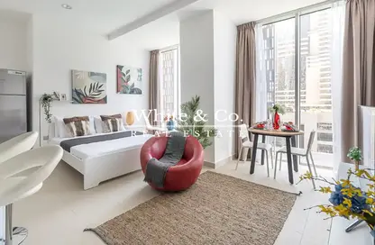 Living / Dining Room image for: Apartment - 1 Bathroom for rent in Cayan Tower - Dubai Marina - Dubai, Image 1