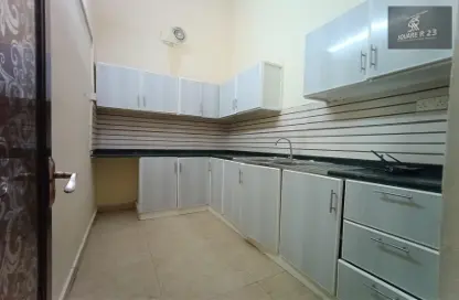 Kitchen image for: Apartment - 1 Bedroom - 1 Bathroom for rent in Mohammed Villas 6 - Mohamed Bin Zayed City - Abu Dhabi, Image 1